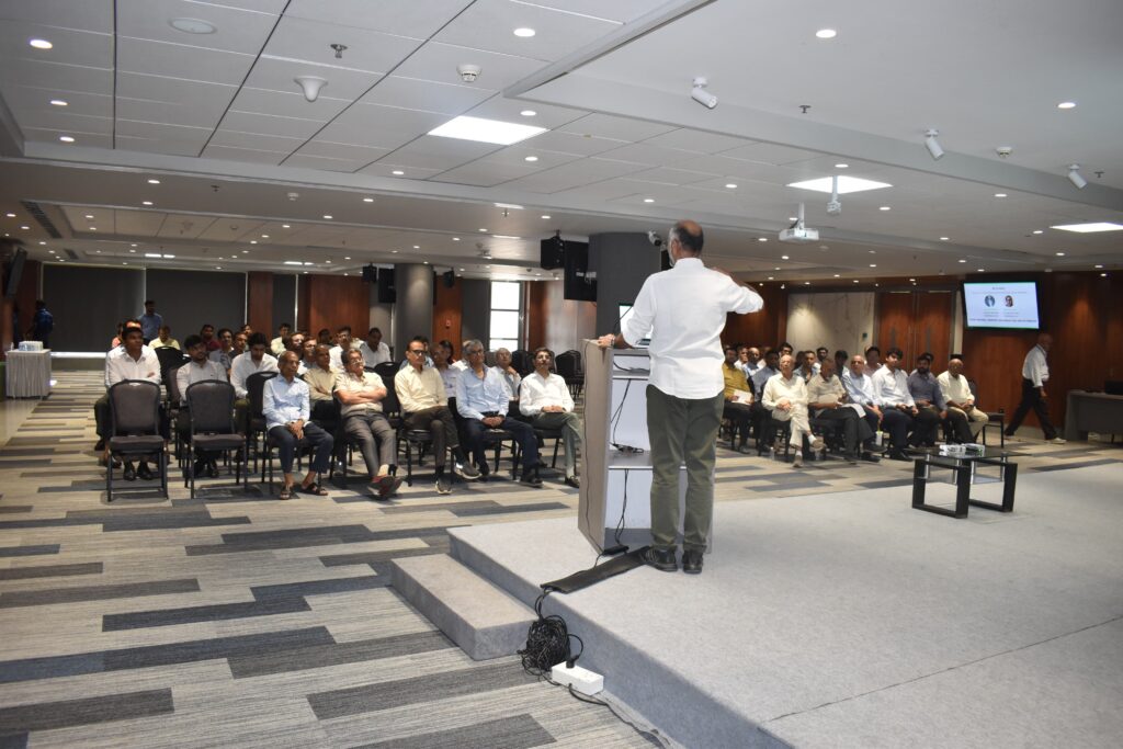 Mr. Janak Mistry presenting on AI-based diamond paternity testing at BDB Convention Hall, Mumbai
