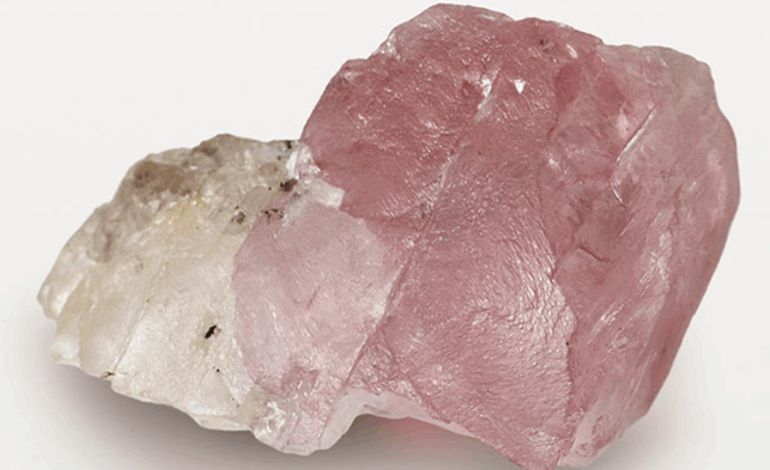 A rare 37.4-carat rough diamond with a distinct pink and colorless half, recovered from the Karowe Mine in Botswana.
