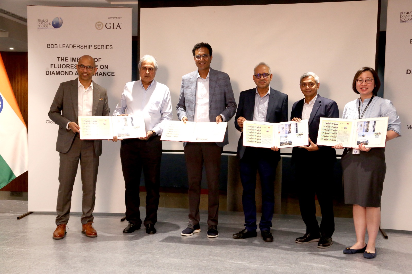 GIA experts addressing industry members during a seminar on fluorescence in natural diamonds at Bharat Diamond Bourse.