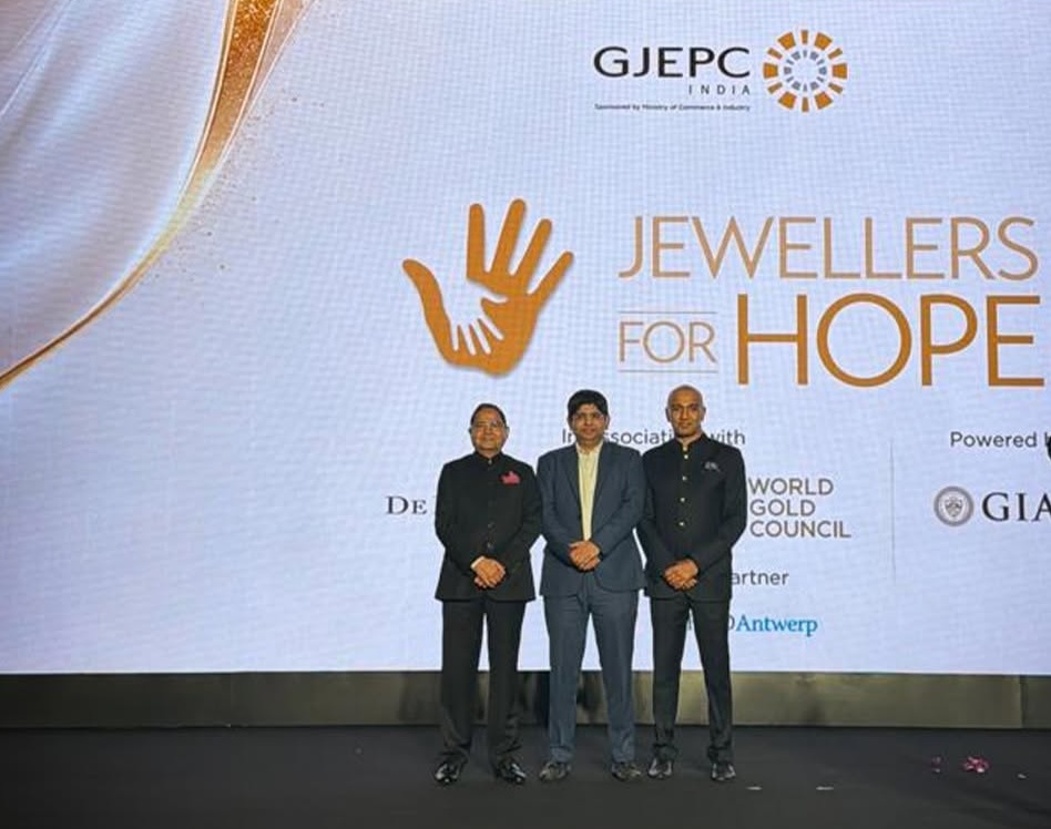 Rahul Narwekar, Madhuri Dixit and GJEPC industry leaders at Jewellers for Hope 2026 charity event in Mumbai.